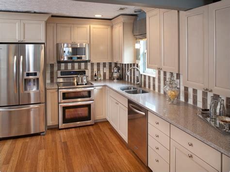 pictures of white kitchen cabinets with stainless steel appliances|white appliances with stainless accents.